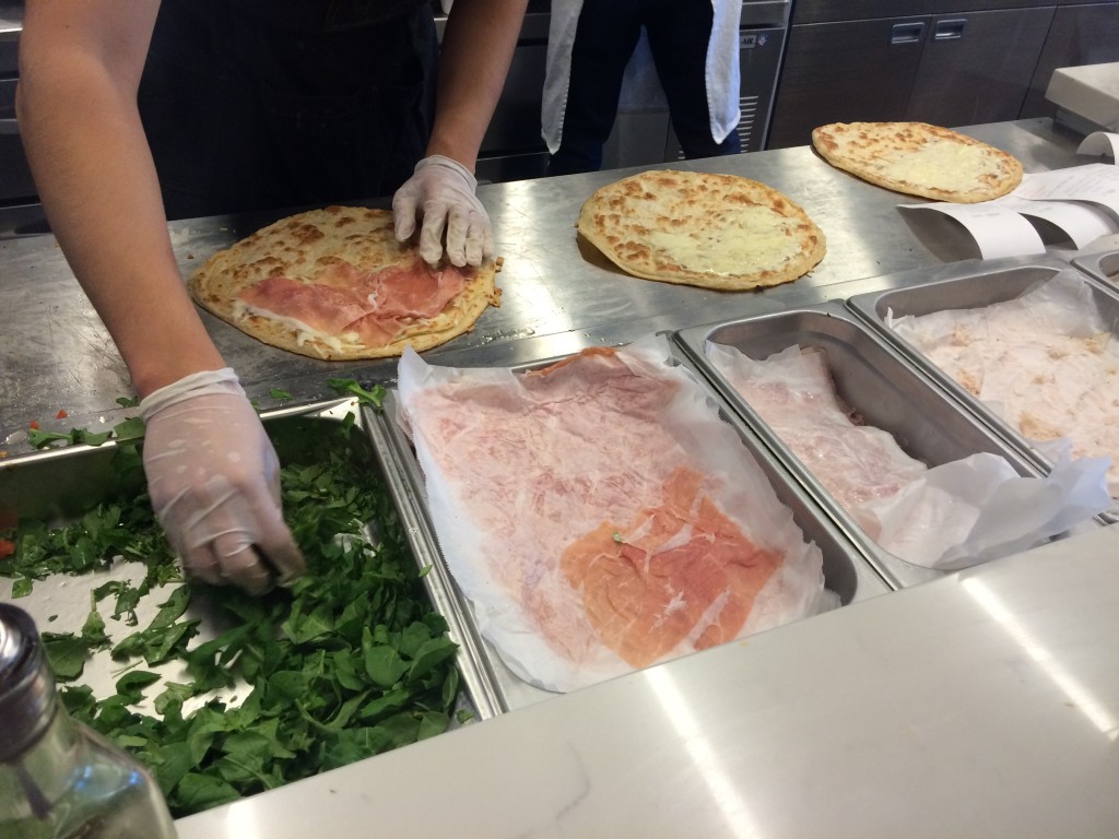 Piadina sandwiches being made