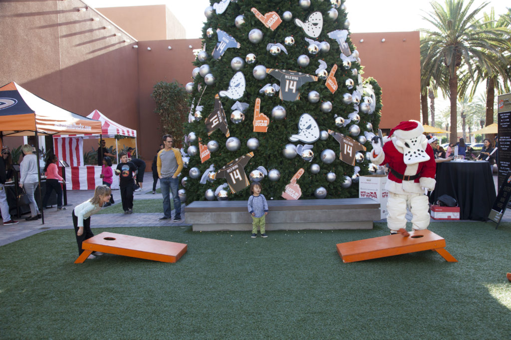 Wild Wing and young fans play games during DUCK The Halls - Family Events 2015.